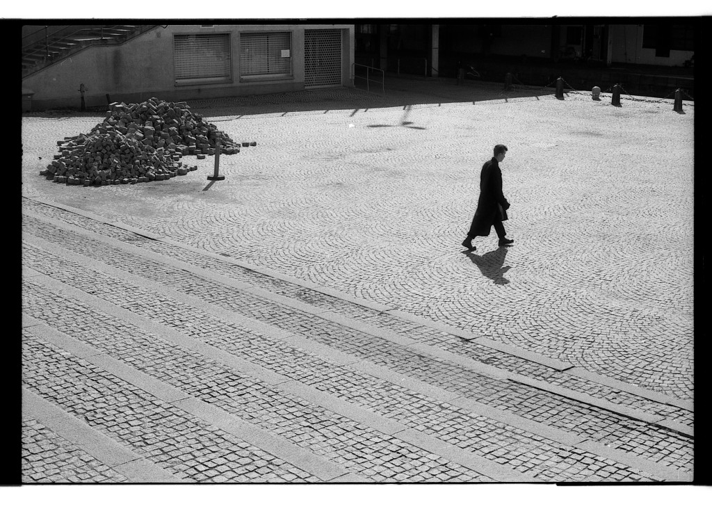 Måns walking across Karl Johan's Square. Soon-to-be-closed rock club Debaser in the background.